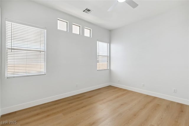8312 Raphael Ct, Las Vegas, NV 89129 - unfurnished room with baseboards, light wood-style flooring, and ceiling fan