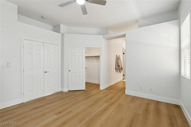 8312 Raphael Ct, Las Vegas, NV 89129 - unfurnished bedroom featuring light wood-style flooring, baseboards, and a ceiling fan
