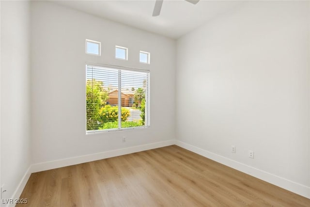 8312 Raphael Ct, Las Vegas, NV 89129 - empty room with baseboards, a ceiling fan, and light wood finished floors