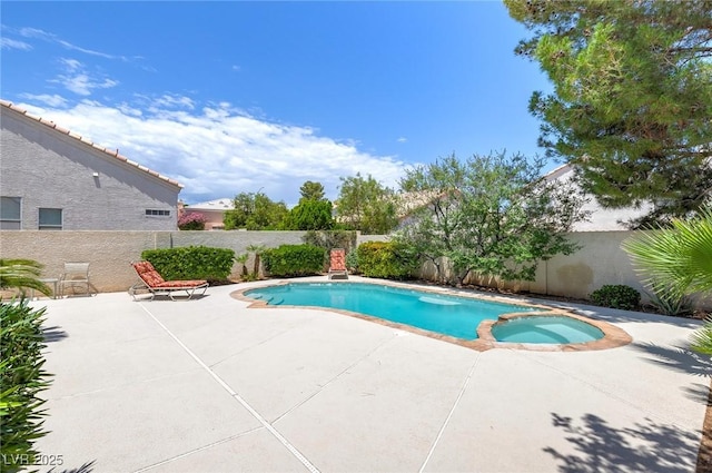 8312 Raphael Ct, Las Vegas, NV 89129 - view of pool with a fenced backyard, a patio, and a pool with connected hot tub
