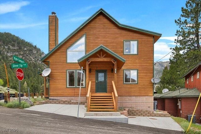 4830 Silver Tip Way, Mount Charleston, NV 89124 - view of front facade featuring a chimney