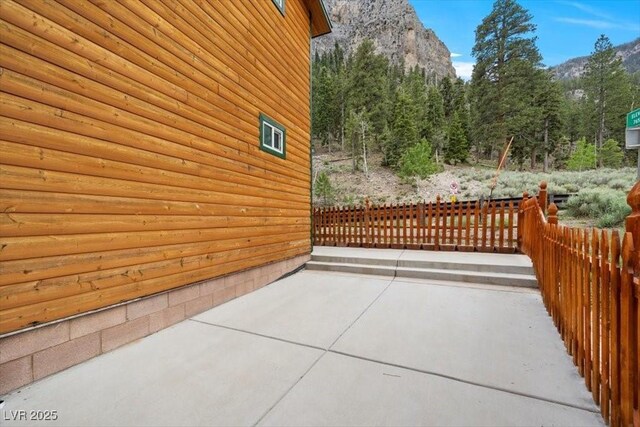 4830 Silver Tip Way, Mount Charleston, NV 89124 - view of patio with a mountain view and a forest view