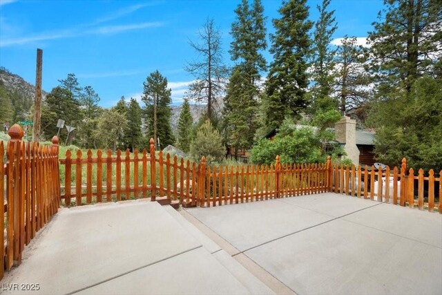 4830 Silver Tip Way, Mount Charleston, NV 89124 - view of patio / terrace featuring view of wooded area