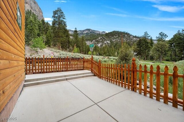 4830 Silver Tip Way, Mount Charleston, NV 89124 - view of patio / terrace featuring a mountain view