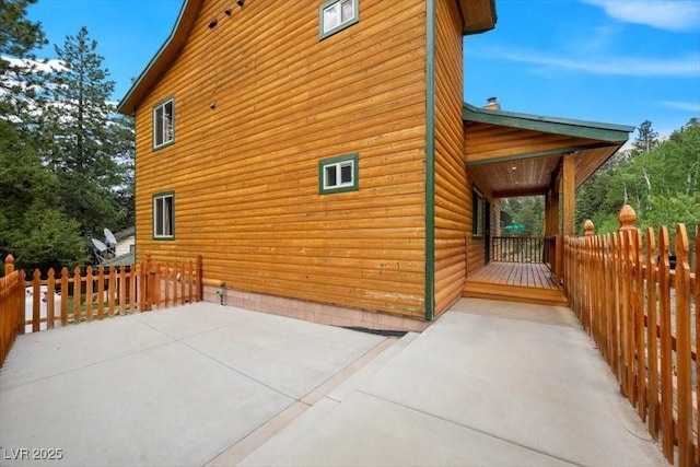4830 Silver Tip Way, Mount Charleston, NV 89124 - view of home's exterior with a patio and faux log siding