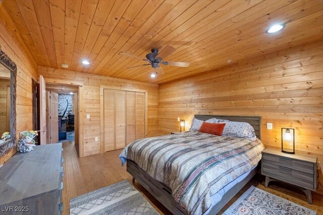4830 Silver Tip Way, Mount Charleston, NV 89124 - bedroom with wooden ceiling, hardwood / wood-style flooring, recessed lighting, wooden walls, and a ceiling fan