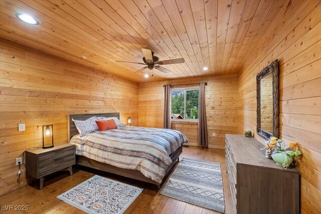 4830 Silver Tip Way, Mount Charleston, NV 89124 - bedroom featuring wooden ceiling, wood walls, wood-type flooring, and recessed lighting