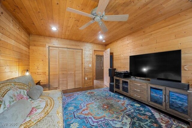 4830 Silver Tip Way, Mount Charleston, NV 89124 - living area with wooden ceiling, wooden walls, a ceiling fan, and recessed lighting