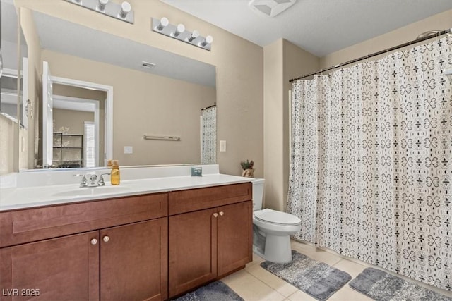 5667 Foxglove Field St, Las Vegas, NV 89130 - bathroom with tile patterned floors, vanity, toilet, and curtained shower