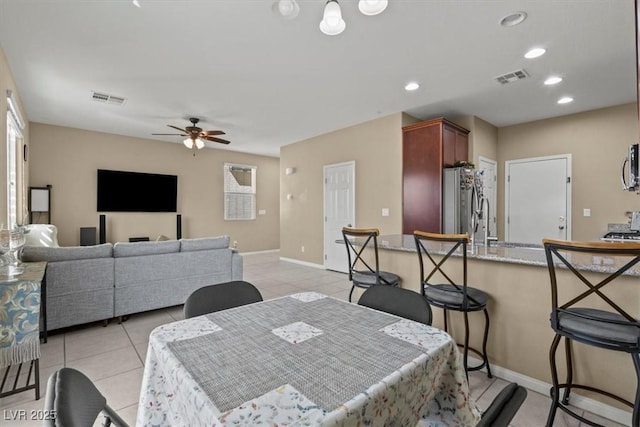5667 Foxglove Field St, Las Vegas, NV 89130 - dining space with light tile patterned flooring, ceiling fan, baseboards, and recessed lighting