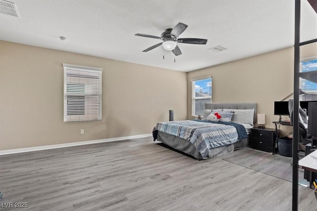 5667 Foxglove Field St, Las Vegas, NV 89130 - bedroom featuring wood finished floors, baseboards, and ceiling fan