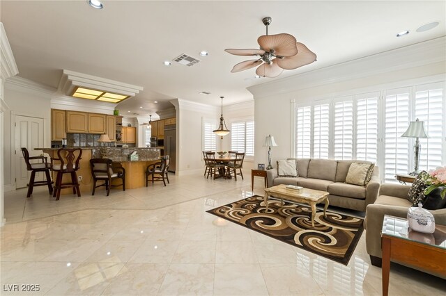 277 Dark Forest Ave, Las Vegas, NV 89123 - living room with crown molding, ceiling fan, recessed lighting, and baseboards