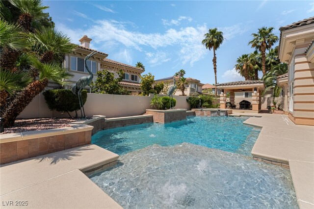 277 Dark Forest Ave, Las Vegas, NV 89123 - view of swimming pool with a fenced backyard, a patio area, and a pool with connected hot tub