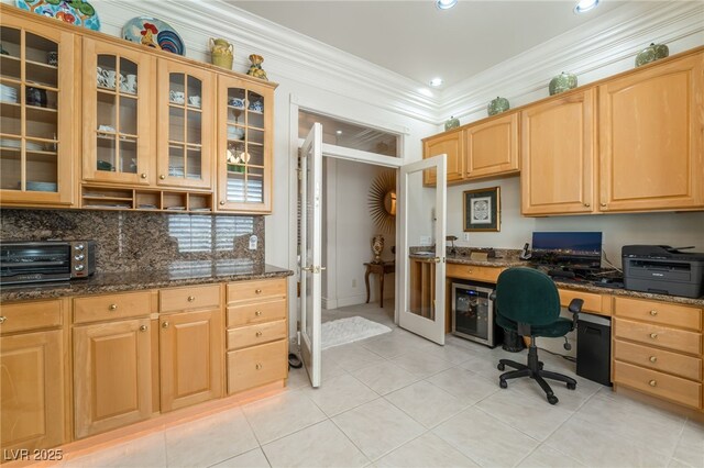 277 Dark Forest Ave, Las Vegas, NV 89123 - kitchen with wine cooler, light tile patterned floors, ornamental molding, glass insert cabinets, and dark stone counters