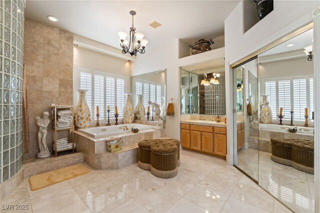 277 Dark Forest Ave, Las Vegas, NV 89123 - bathroom with a bath, vanity, a chandelier, and recessed lighting