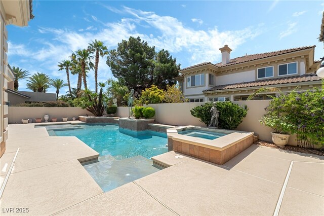 277 Dark Forest Ave, Las Vegas, NV 89123 - view of pool with a patio area, a fenced backyard, and a pool with connected hot tub