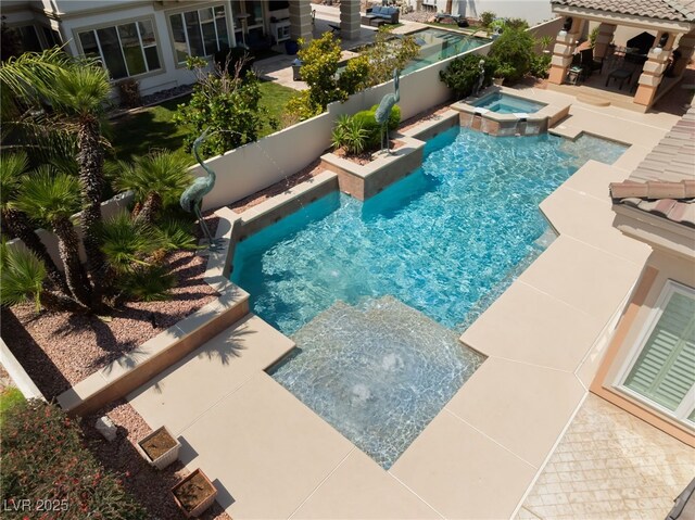 277 Dark Forest Ave, Las Vegas, NV 89123 - view of pool featuring a pool with connected hot tub and a patio area