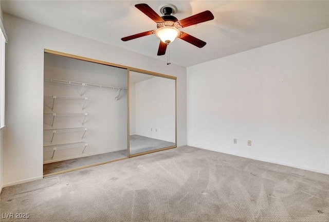 445 Intrepid Ct, Boulder City, NV 89005 - unfurnished bedroom featuring carpet flooring, a closet, and a ceiling fan