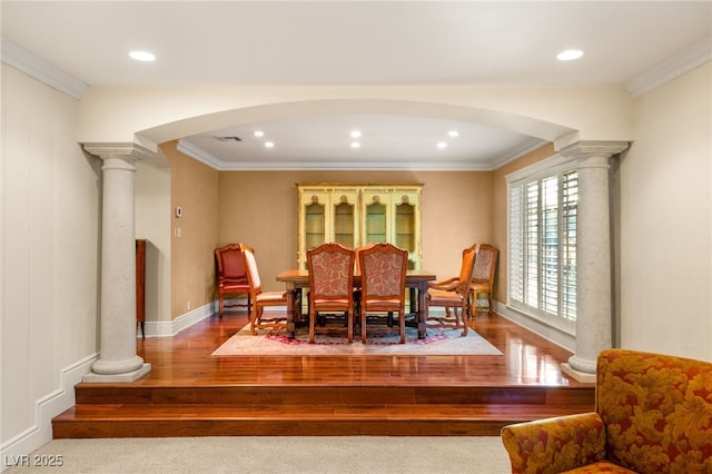 2001 Silver Ave, Las Vegas, NV 89102 - dining space with ornate columns, wood finished floors, arched walkways, crown molding, and recessed lighting