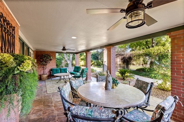 2001 Silver Ave, Las Vegas, NV 89102 - view of patio with ceiling fan, outdoor dining area, and an outdoor living space