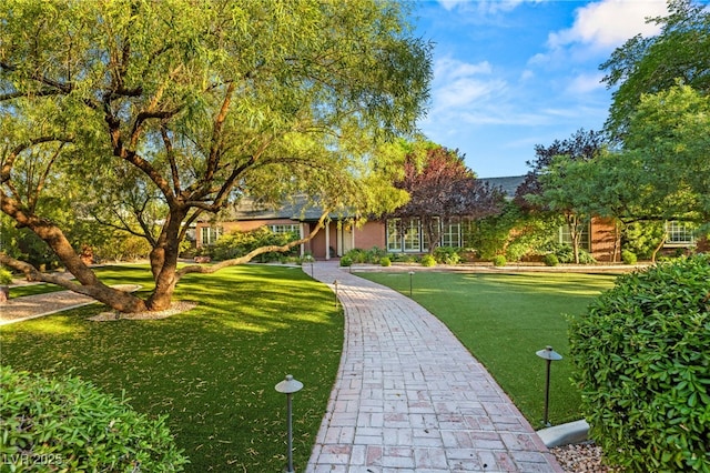 2001 Silver Ave, Las Vegas, NV 89102 - view of home's community featuring an area to practice putting and a lawn