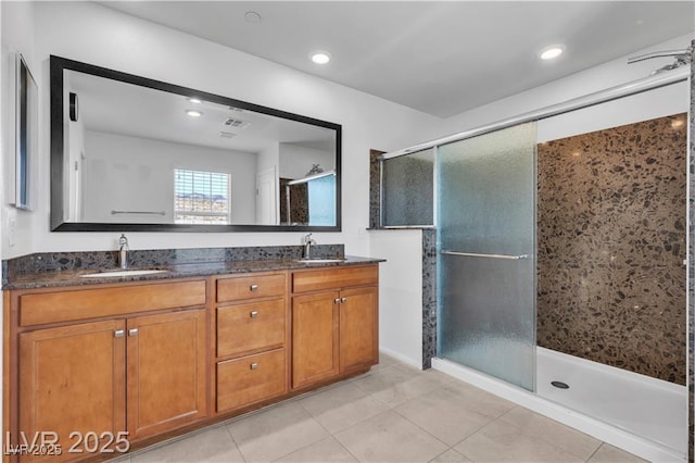 2832 Aragon Terrace Way, Henderson, NV 89044 - full bathroom featuring double vanity, a stall shower, tile patterned floors, and recessed lighting
