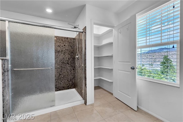 2832 Aragon Terrace Way, Henderson, NV 89044 - full bathroom with tile patterned floors, a stall shower, baseboards, and a spacious closet