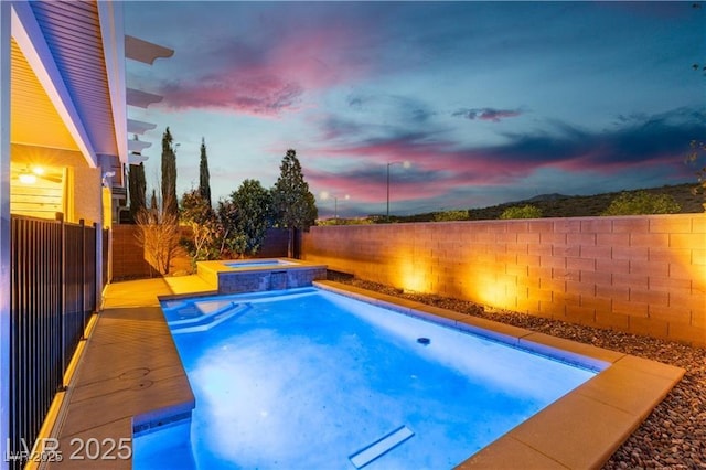 2832 Aragon Terrace Way, Henderson, NV 89044 - view of pool featuring an in-ground hot tub and a fenced backyard