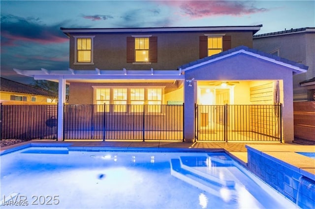 2832 Aragon Terrace Way, Henderson, NV 89044 - back of house at dusk with stucco siding