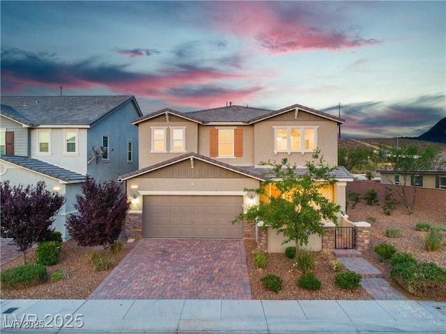 2832 Aragon Terrace Way, Henderson, NV 89044 - traditional-style house featuring decorative driveway, stucco siding, a garage, and stone siding