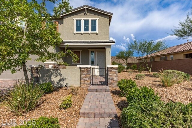2832 Aragon Terrace Way, Henderson, NV 89044 - view of front of home featuring a fenced front yard, a gate, and stucco siding