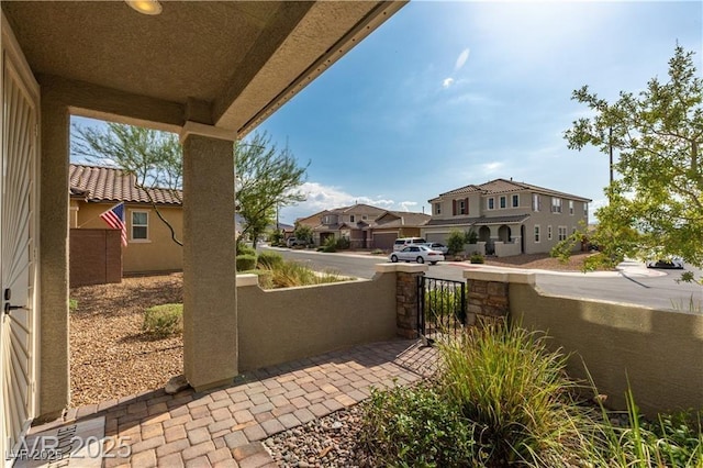 2832 Aragon Terrace Way, Henderson, NV 89044 - view of patio / terrace featuring a residential view and a gate