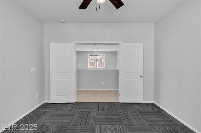 2832 Aragon Terrace Way, Henderson, NV 89044 - unfurnished room featuring ceiling fan, a chandelier, carpet flooring, and baseboards