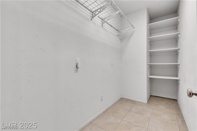 2832 Aragon Terrace Way, Henderson, NV 89044 - walk in closet with light tile patterned floors