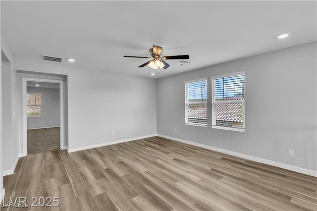 2832 Aragon Terrace Way, Henderson, NV 89044 - spare room featuring plenty of natural light, wood finished floors, baseboards, and recessed lighting