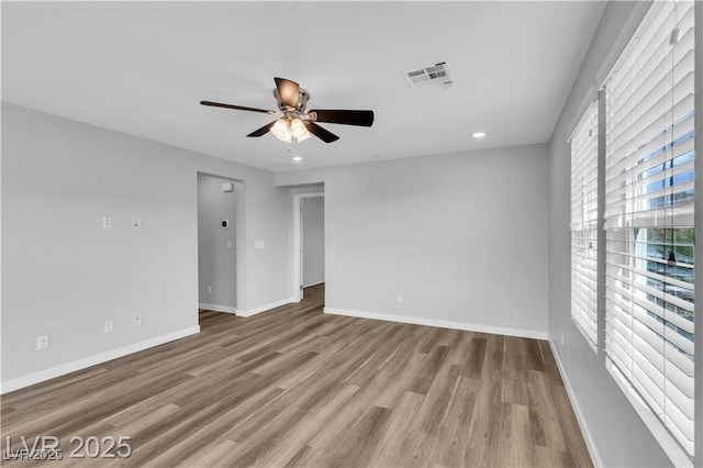 2832 Aragon Terrace Way, Henderson, NV 89044 - empty room with a ceiling fan, wood finished floors, baseboards, and recessed lighting