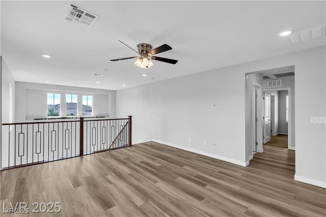 2832 Aragon Terrace Way, Henderson, NV 89044 - spare room featuring a ceiling fan, wood finished floors, baseboards, and recessed lighting
