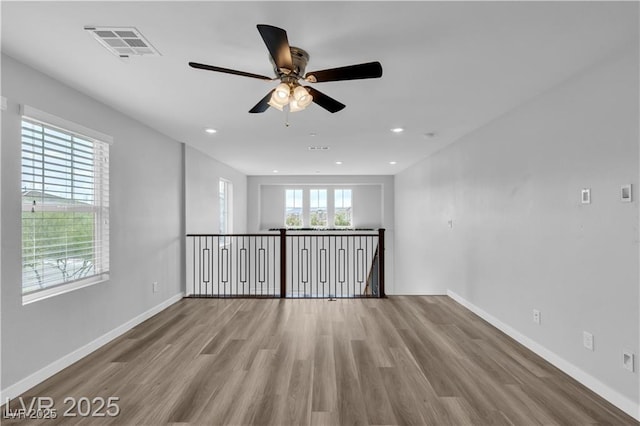 2832 Aragon Terrace Way, Henderson, NV 89044 - empty room featuring ceiling fan, wood finished floors, baseboards, and recessed lighting