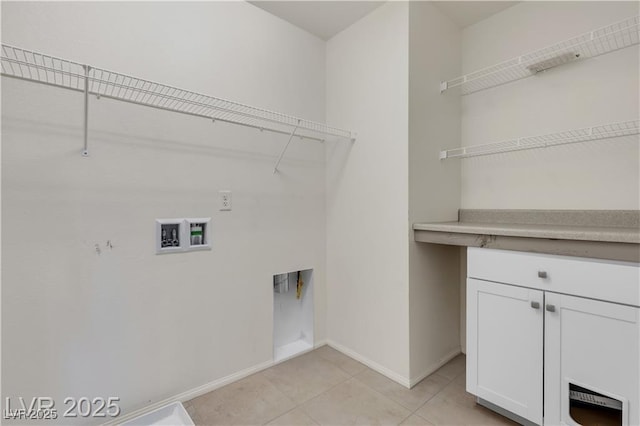 2832 Aragon Terrace Way, Henderson, NV 89044 - laundry room with baseboards, light tile patterned floors, and washer hookup