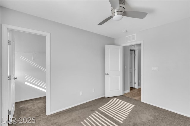 2832 Aragon Terrace Way, Henderson, NV 89044 - unfurnished bedroom with carpet flooring, baseboards, a ceiling fan, and a closet