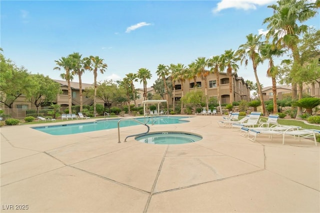 8985 S Durango Dr Unit 1177, Las Vegas, NV 89113 - community pool featuring a community hot tub and a patio area