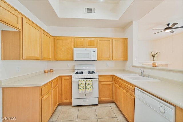 8985 S Durango Dr Unit 1177, Las Vegas, NV 89113 - kitchen with white appliances, a sink, ceiling fan, light tile patterned floors, and light countertops