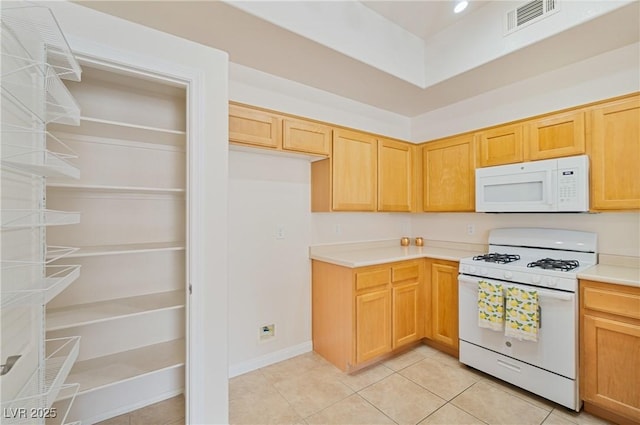 8985 S Durango Dr Unit 1177, Las Vegas, NV 89113 - kitchen featuring white appliances, light tile patterned floors, and light countertops