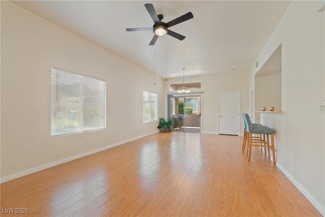 8985 S Durango Dr Unit 1177, Las Vegas, NV 89113 - living room featuring light wood-style floors, a ceiling fan, and baseboards