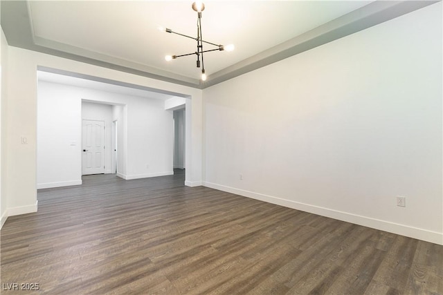 913 Hickory Park St, Las Vegas, NV 89138 - unfurnished room with a chandelier and dark wood finished floors