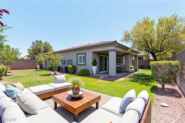 913 Hickory Park St, Las Vegas, NV 89138 - rear view of property with outdoor lounge area, a patio area, a fenced backyard, and stucco siding