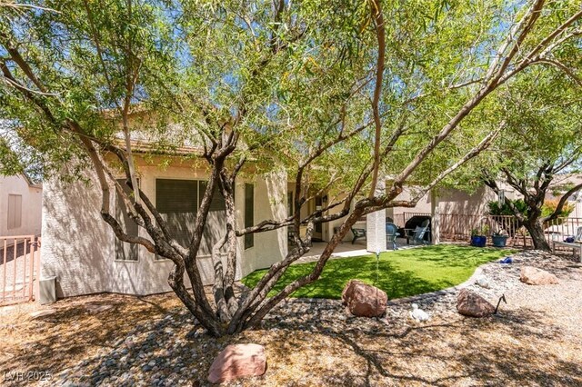 2111 Tiger Links Dr, Henderson, NV 89012 - back of house with stucco siding