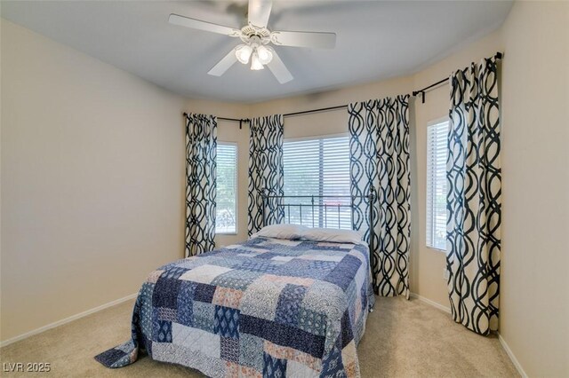 2111 Tiger Links Dr, Henderson, NV 89012 - bedroom featuring light carpet, baseboards, and ceiling fan