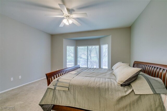 2111 Tiger Links Dr, Henderson, NV 89012 - carpeted bedroom with baseboards and ceiling fan
