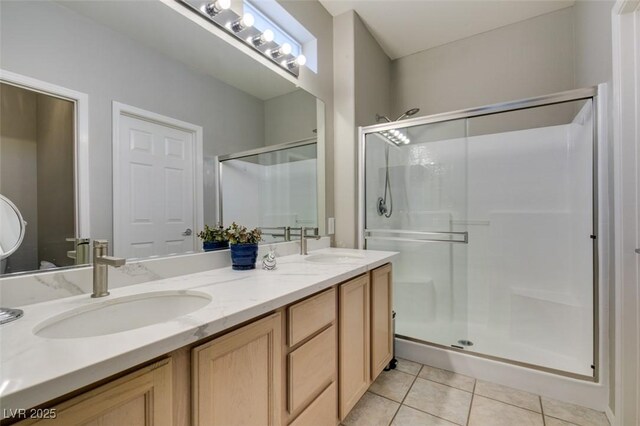 2111 Tiger Links Dr, Henderson, NV 89012 - full bathroom featuring tile patterned floors, a stall shower, double vanity, and toilet